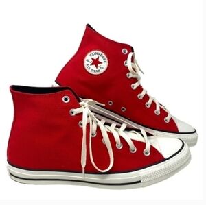 Red and white sports shoes